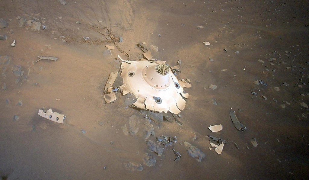 Helicóptero innovador de la NASA descubre restos de naves espaciales en Marte - Contraportada del cono de perseverancia