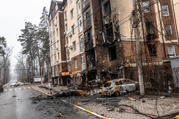 Remnants of an Russian  armored personnel carrier in a residential neighborhood of Irpin, Ukraine, on Friday.