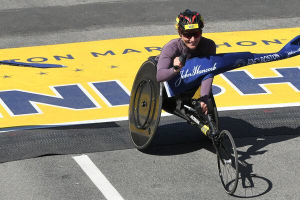Manuela Schär of Switzerland won her fourth Boston Marathon in the women’s wheelchair division.